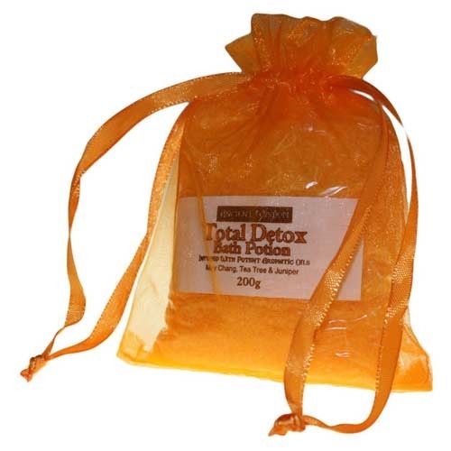 A 200g brown paper bag filled with detoxifying bath salts and botanical ingredients for a spiritual soak.