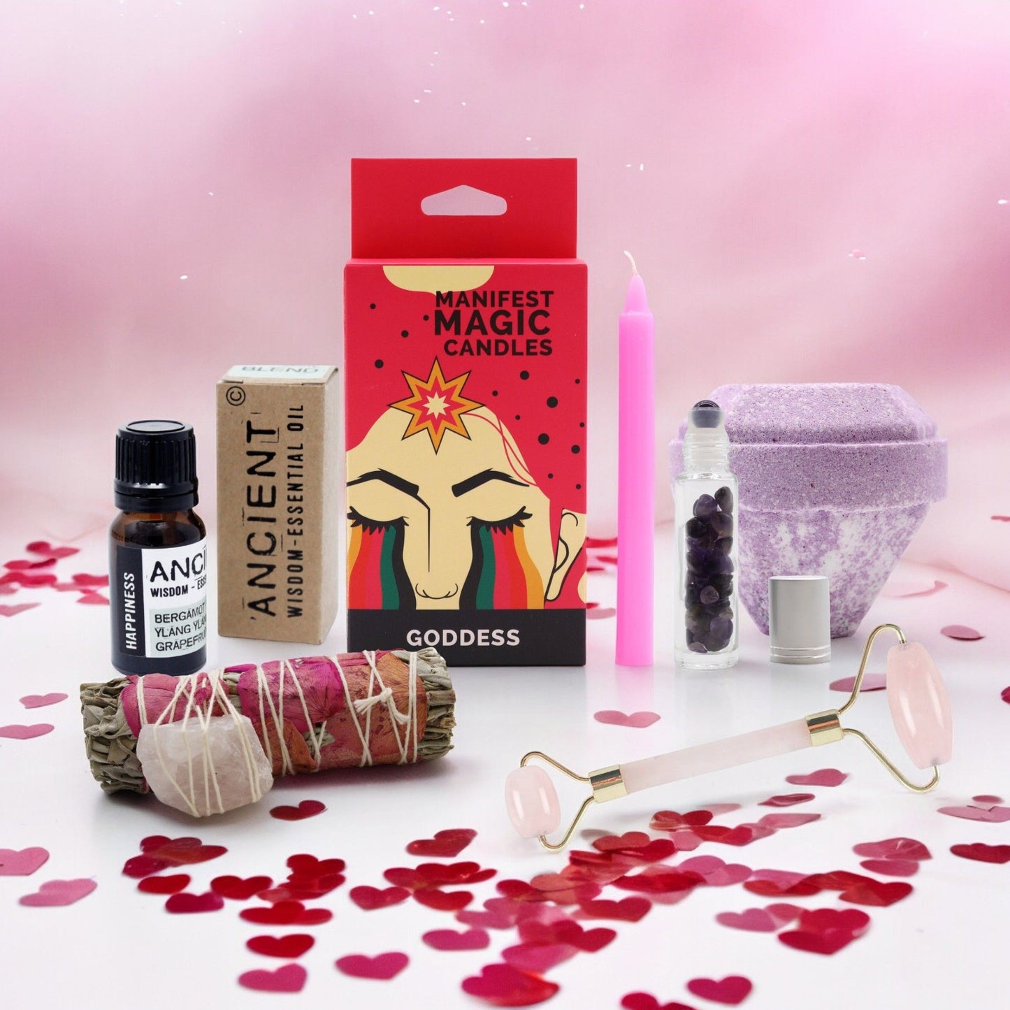 Curated wellness gift box featuring a smudge stick and luxurious self-care products for a relaxing home ritual.
