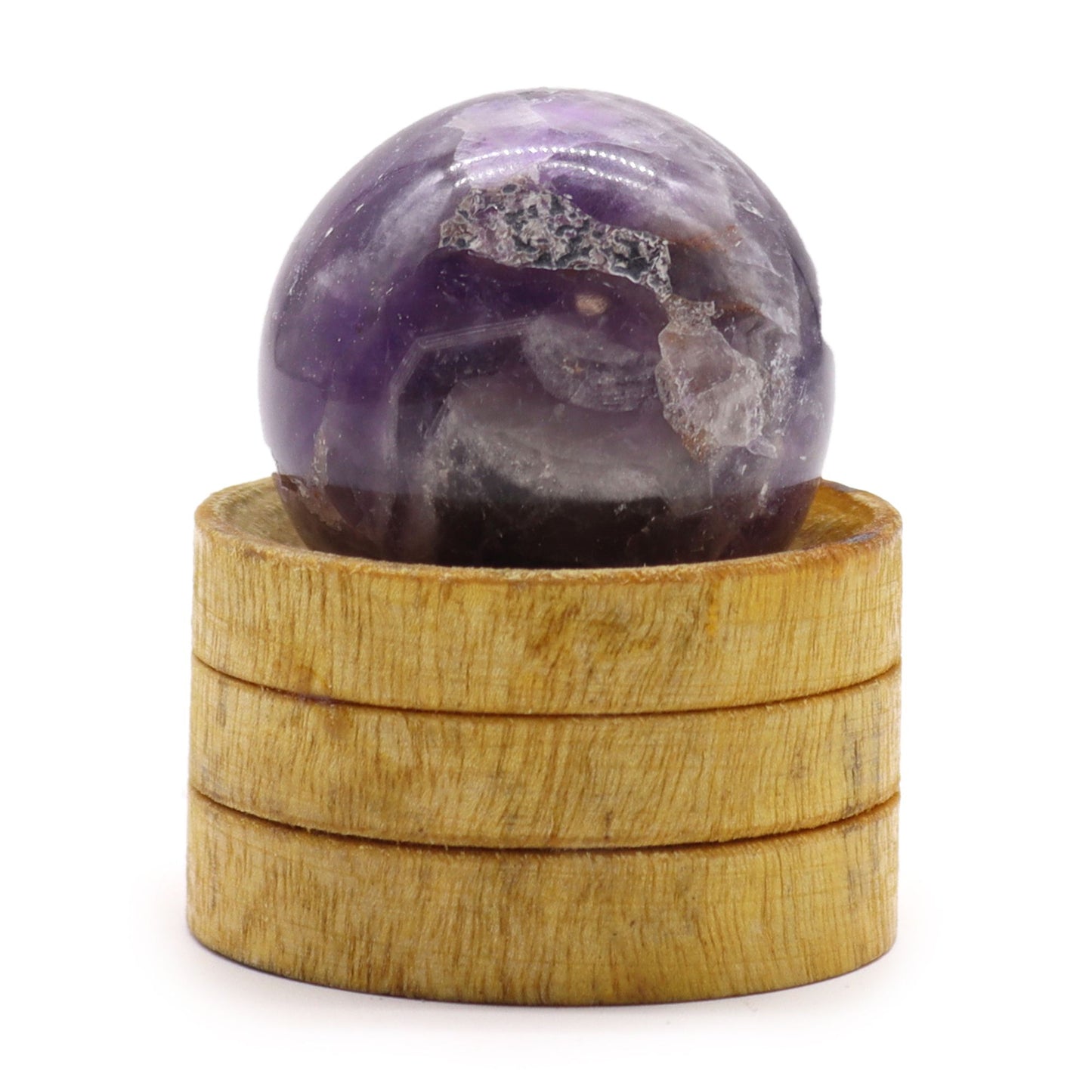 Deep purple African Amethyst crystal sphere, 40mm diameter, displayed on a simple wooden stand.