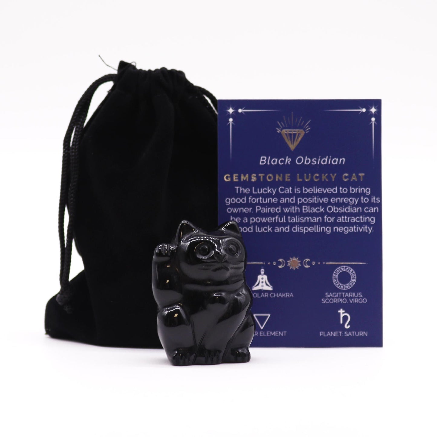 Small, polished black obsidian gemstone figurine carved into the shape of a traditional lucky cat with one paw raised.