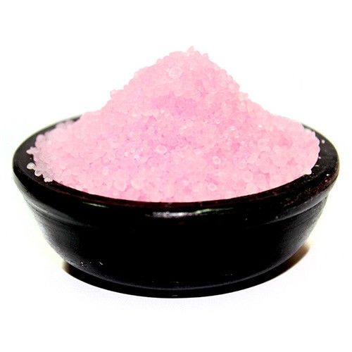 Small pink scented simmering granules for oil burners with a delicate rose fragrance.