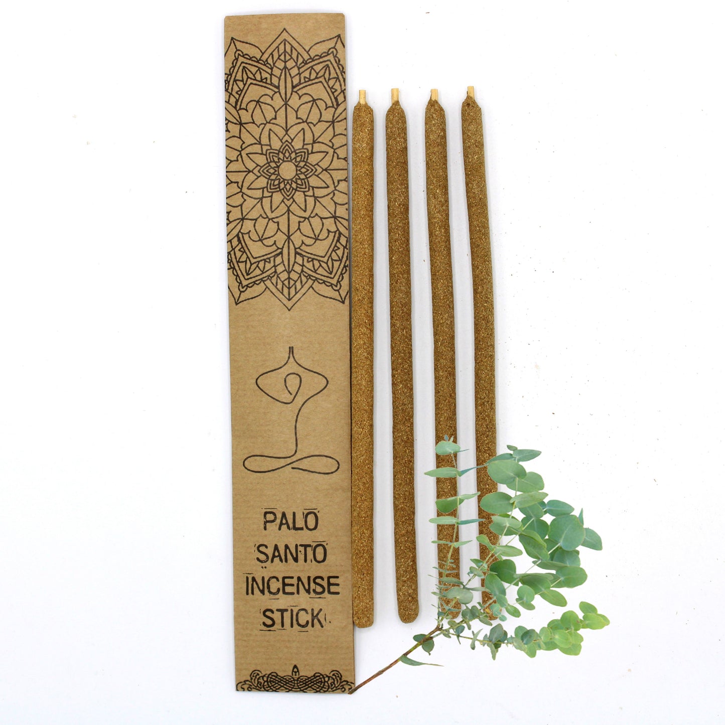 Large natural wood incense sticks infused with eucalyptus, resting on a rustic surface.