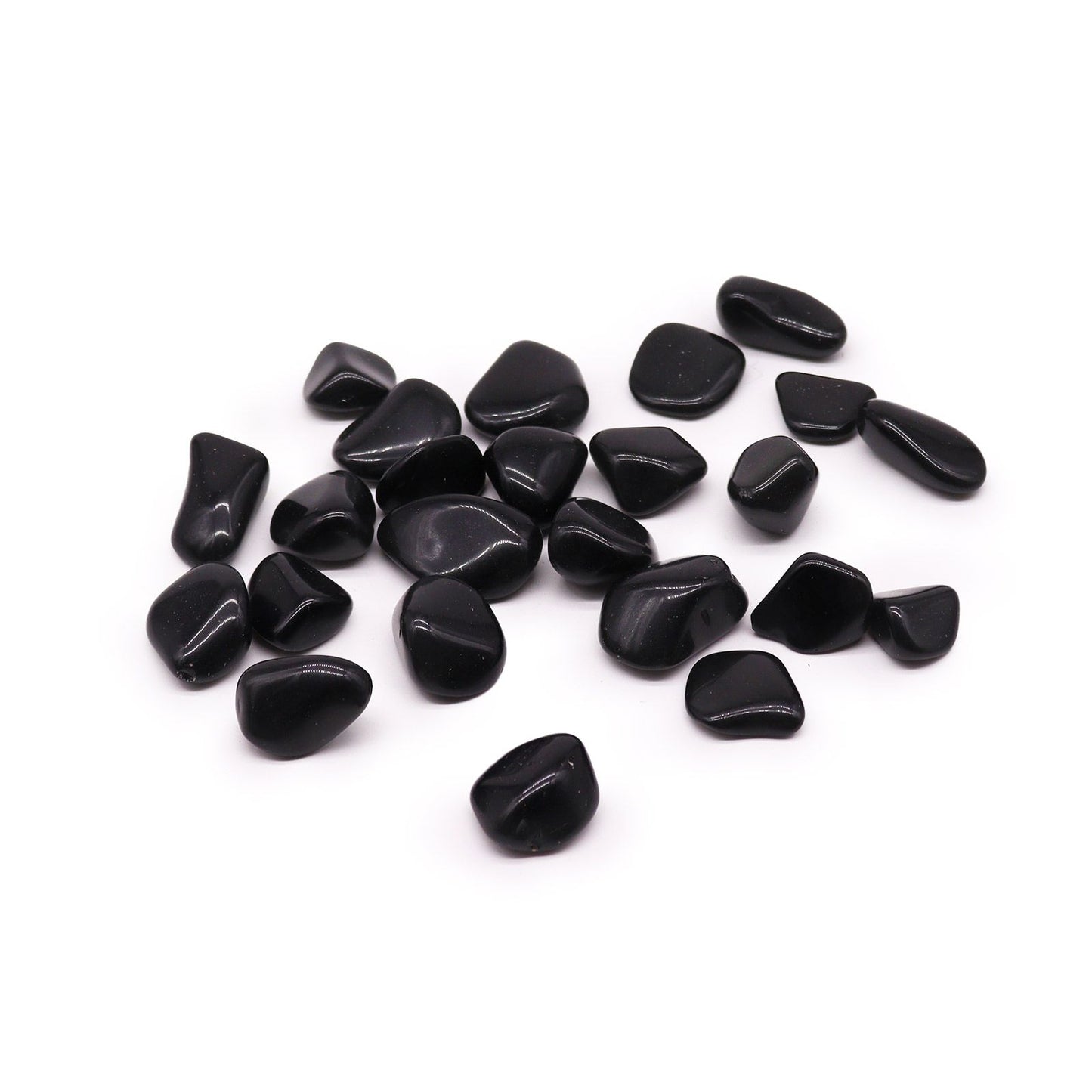 Smooth polished large black obsidian tumbled stones with a reflective glassy surface.