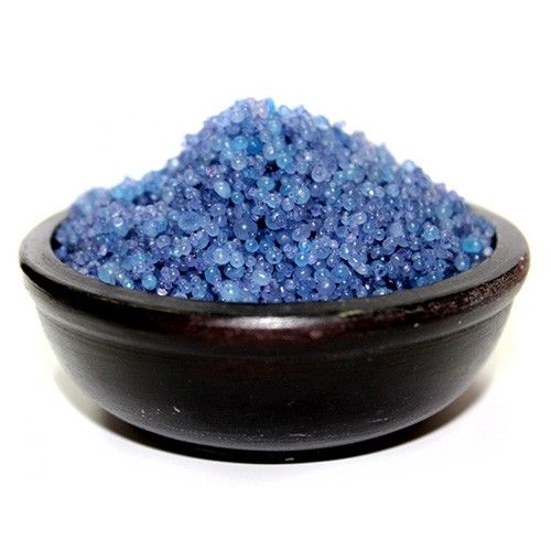 Close-up of aromatic blue simmering granules for home fragrance and oil burners.