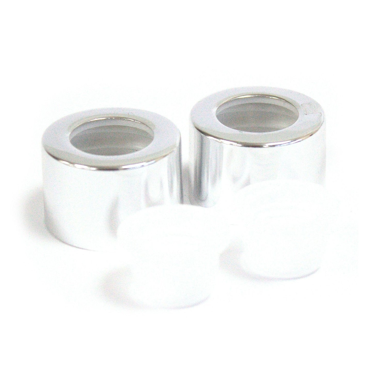 Sleek silver circular reed diffuser bottle cap with a matching travel plug and cork seal.