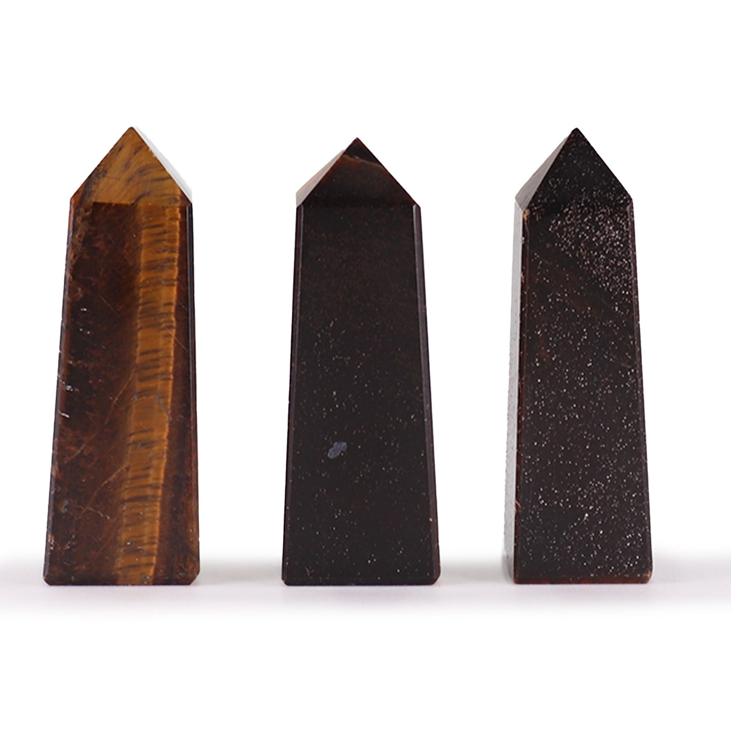 Small polished Tiger Eye gemstone obelisk point with characteristic golden-brown bands and a sharp pointed tip.