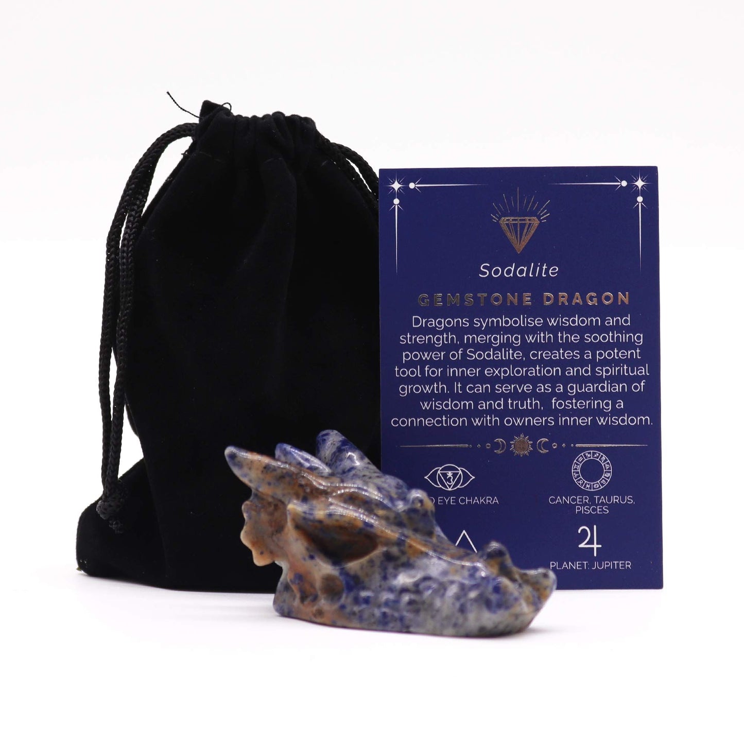 Intricately carved large gemstone dragon head made from mottled blue and white sodalite crystal.