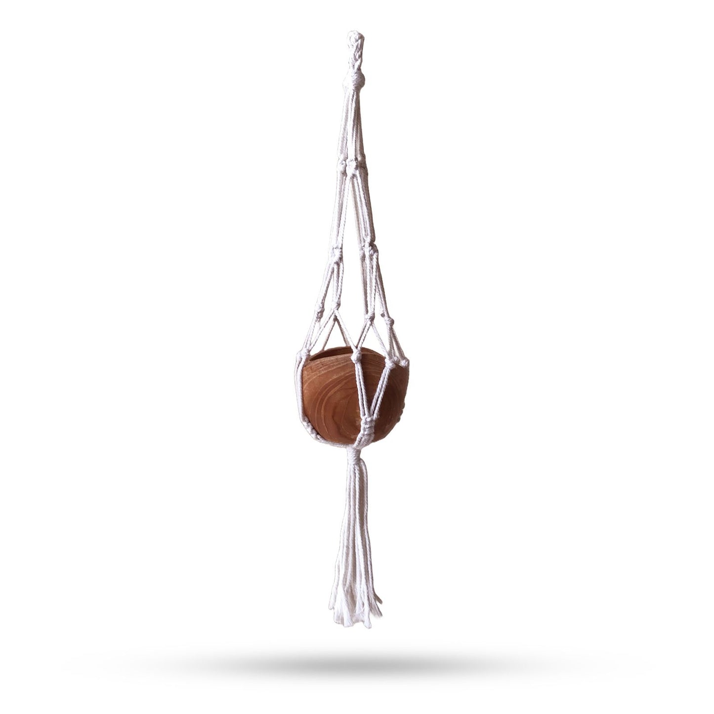 Hand-woven natural cotton macrame plant hanger featuring a teardrop design for small indoor pots.