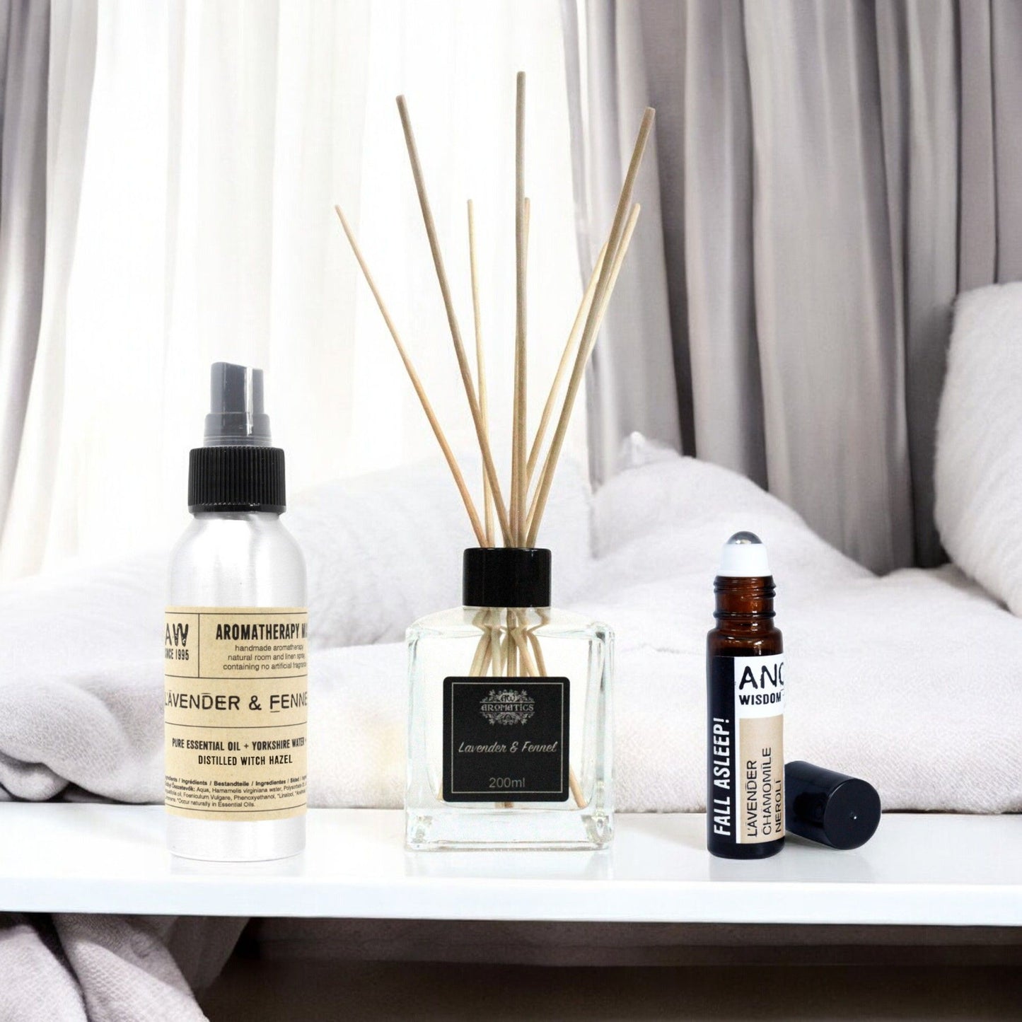 Aromatherapy sleep kit featuring a lavender and fennel essential oil mist bottle in a serene setting.