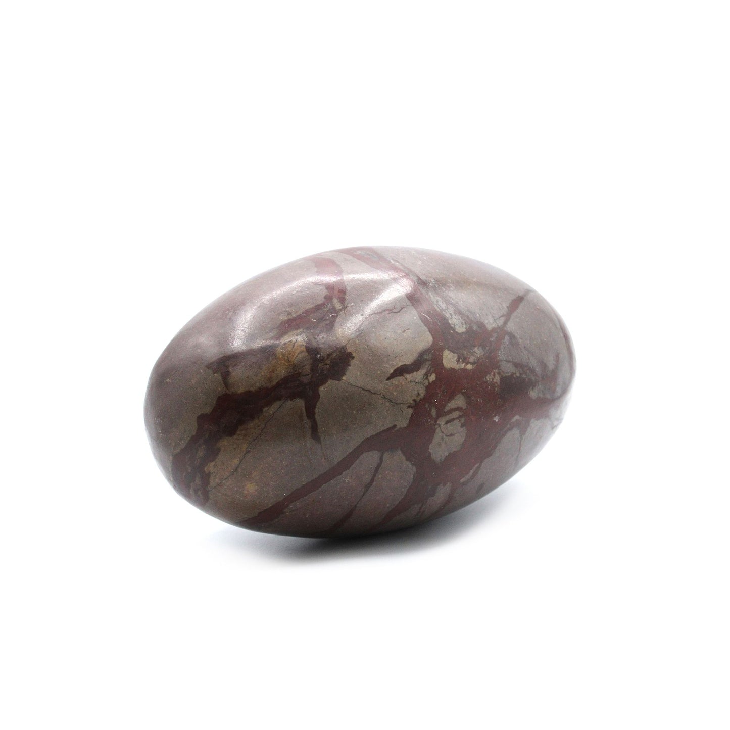 Smooth egg-shaped Shiva Lingam stone with natural brown and tan earthy markings on a neutral background.