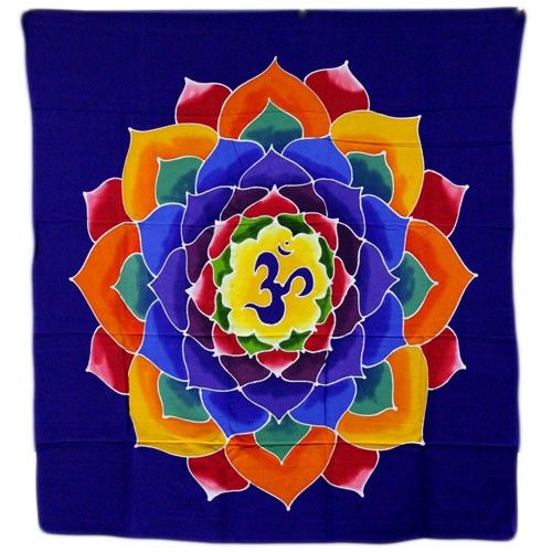 Large batik wall hanging featuring the Om and Flower of Life symbols in vibrant hand-dyed colours.