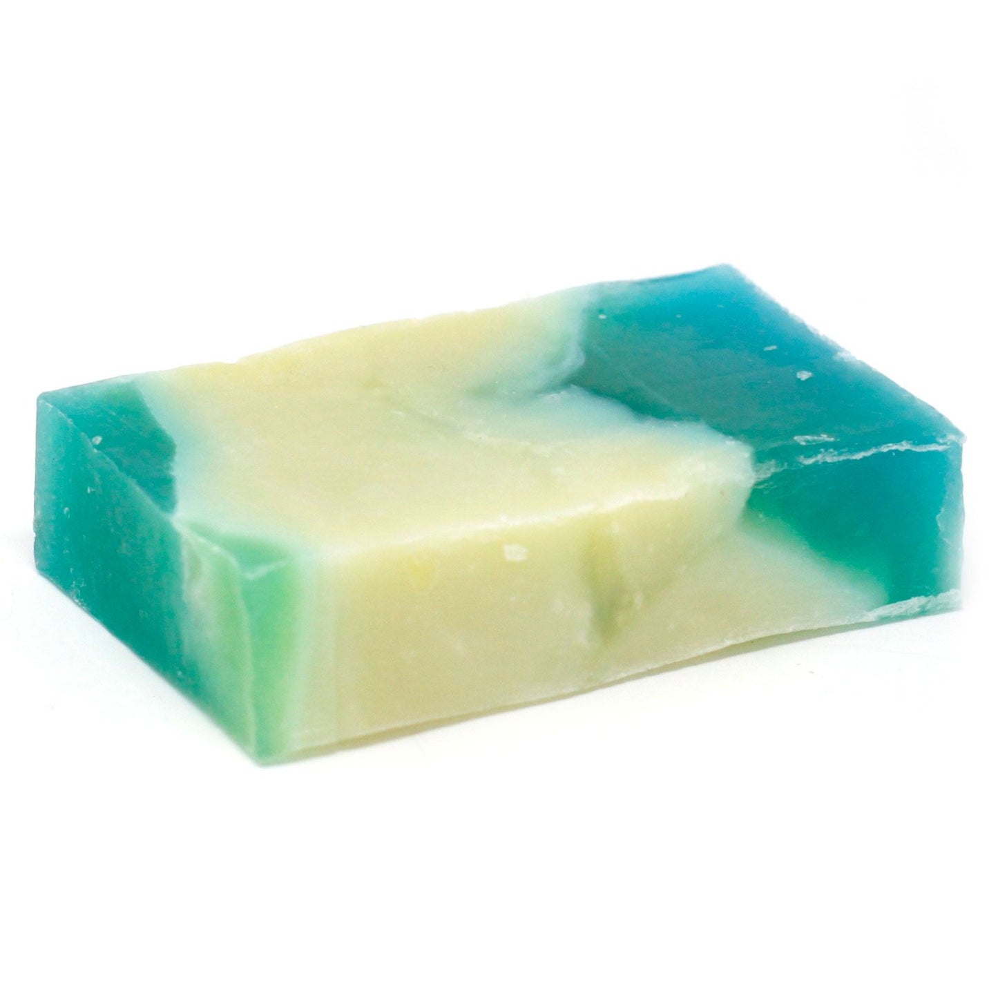 Hand-cut slice of artisan rosemary olive oil soap with a natural, rustic texture.