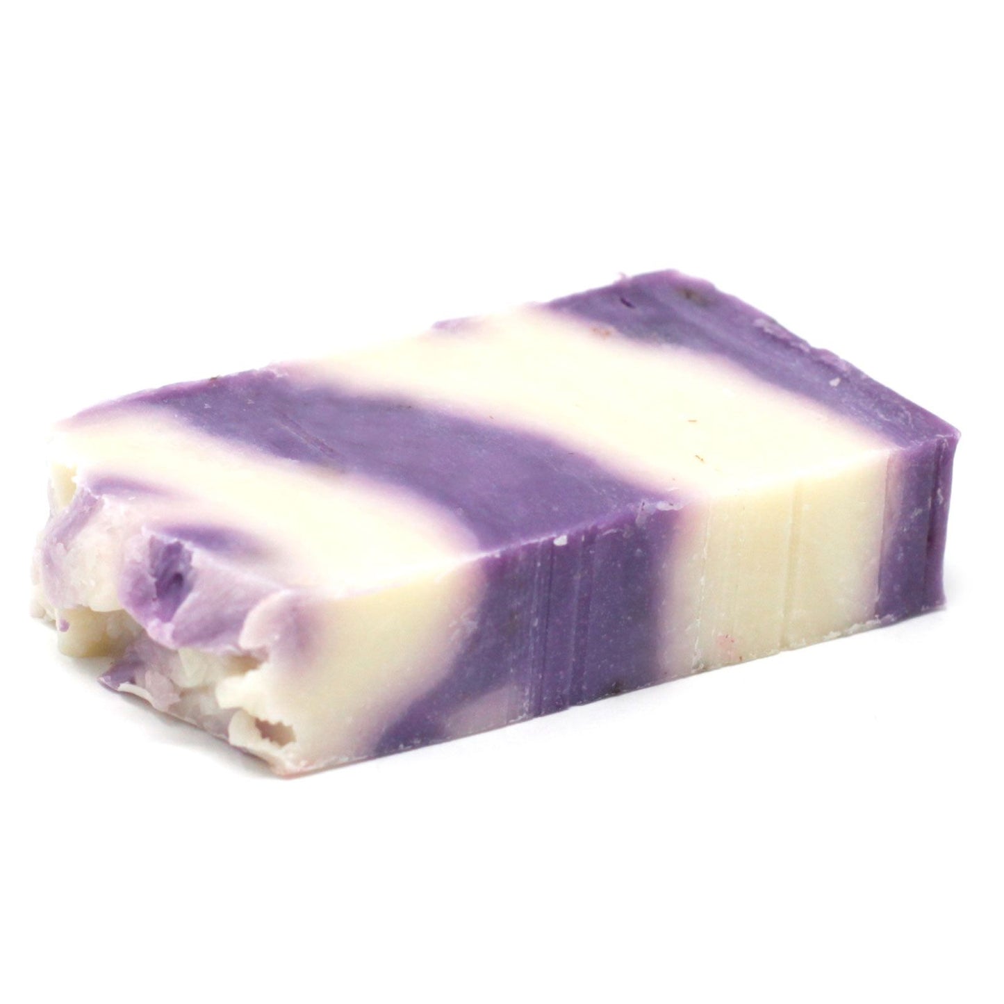 Handmade artisan lavender olive oil soap slice with dried lavender buds and a rustic textured finish.