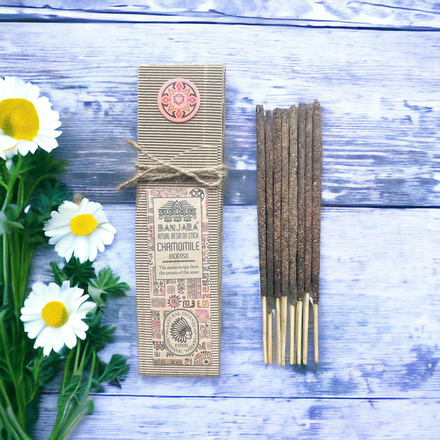 Handcrafted incense stick coated in natural chamomile resin, ideal for creating a calming aromatherapy environment.
