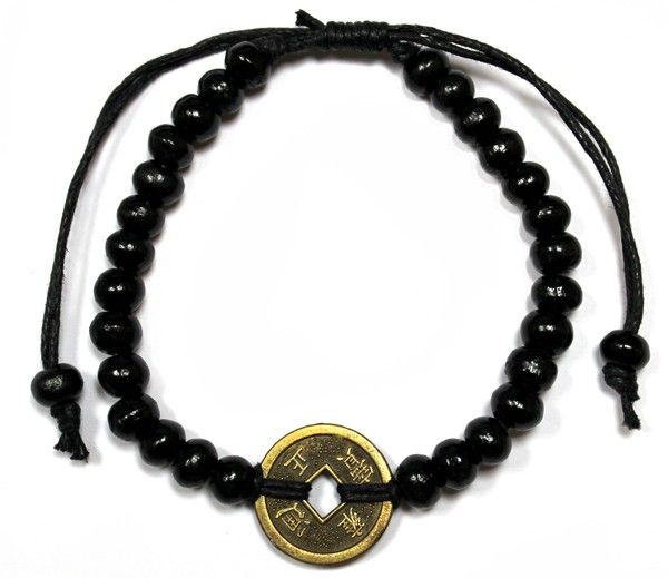 Handcrafted black wood bead bracelet featuring traditional Chinese fortune coins for luck and prosperity.
