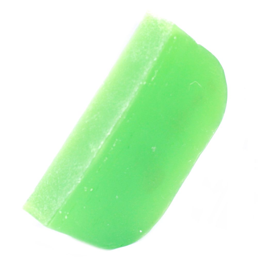 Vividly coloured handmade solid shampoo slice infused with eucalyptus and argan oil on a neutral background.
