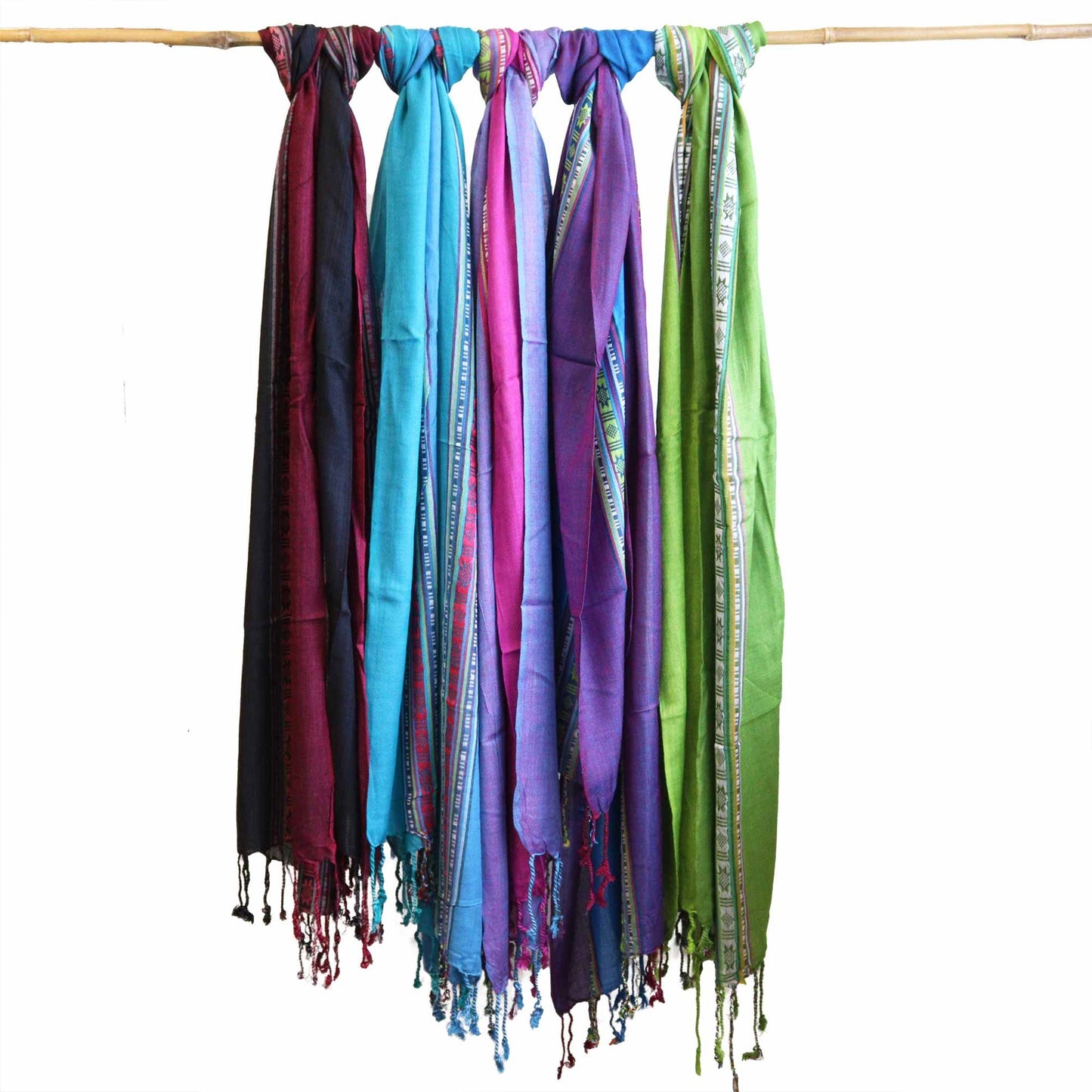Long lightweight scarf in a rich passion purple shade with traditional Indian-inspired patterns and delicate fringe edges.