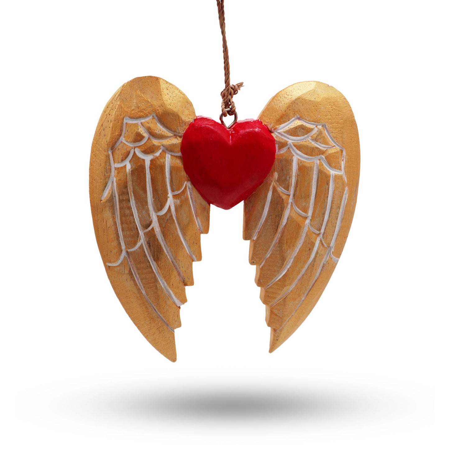 Hand-painted gold wooden angel wing and heart Christmas decorations with white detail hanging from a rustic string.