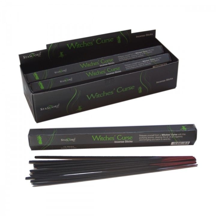 Pack of black incense sticks with mystical themed packaging on a neutral background.