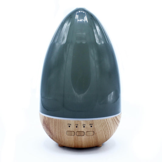 Elegant white ultrasonic aroma diffuser with a minimalist design and soft LED illumination.