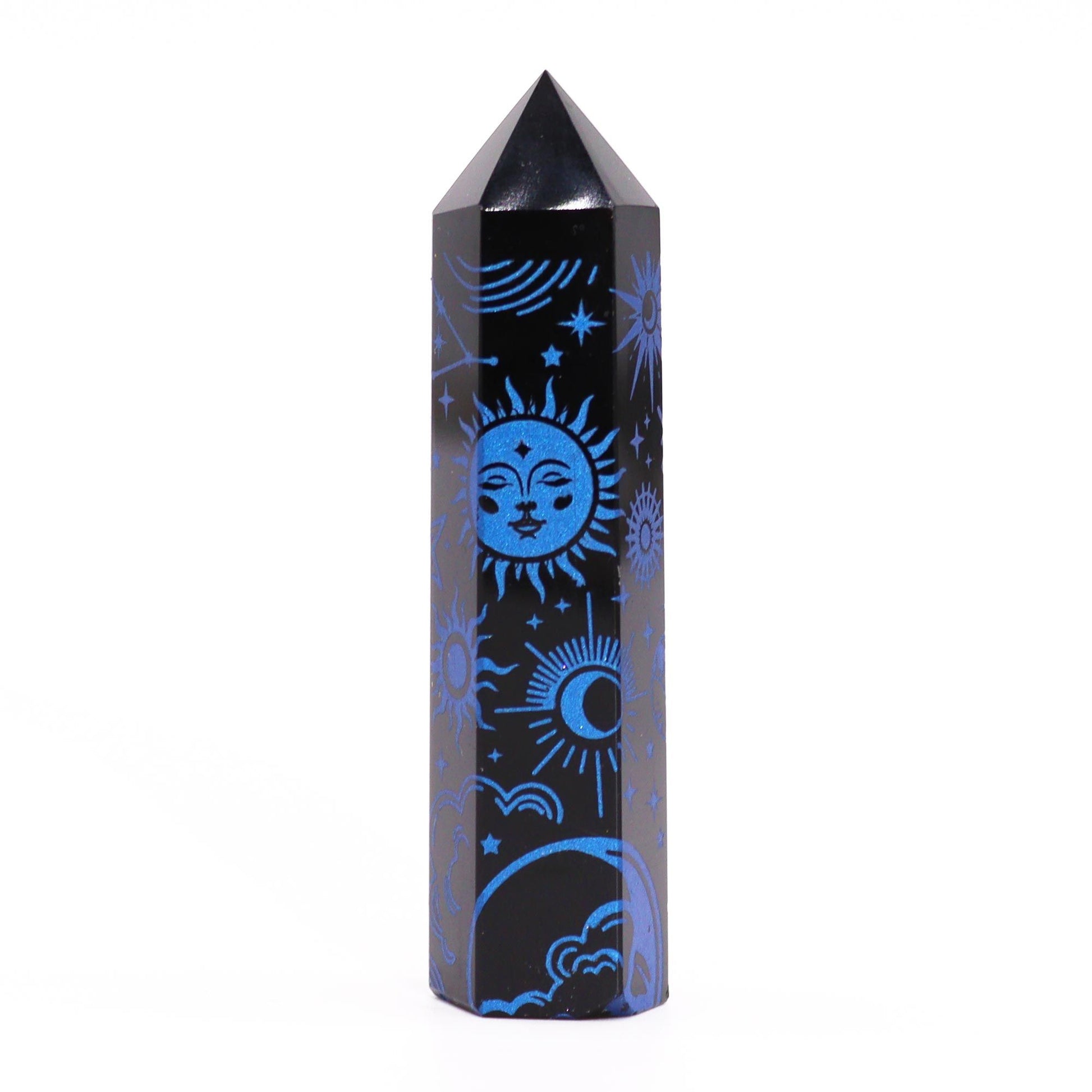 Polished black obsidian crystal point featuring intricate mystical midnight blue designs standing on a flat surface.