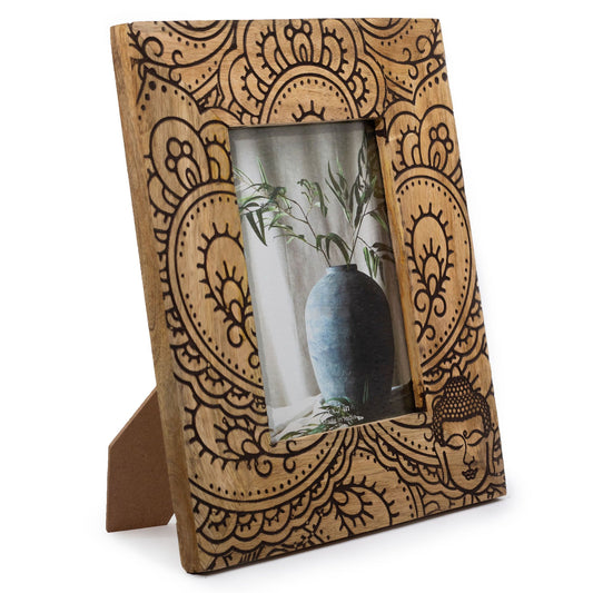 Large black mango wood picture frame with an intricately carved Buddha design, sized for thirteen by eighteen centimetre phot