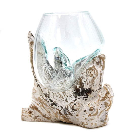 Hand-blown molten glass bowl slumped over a natural whitewashed wooden root base.