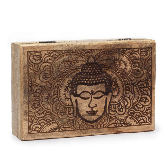Large rectangular black wooden box featuring an intricate engraved Buddha face design on the lid.