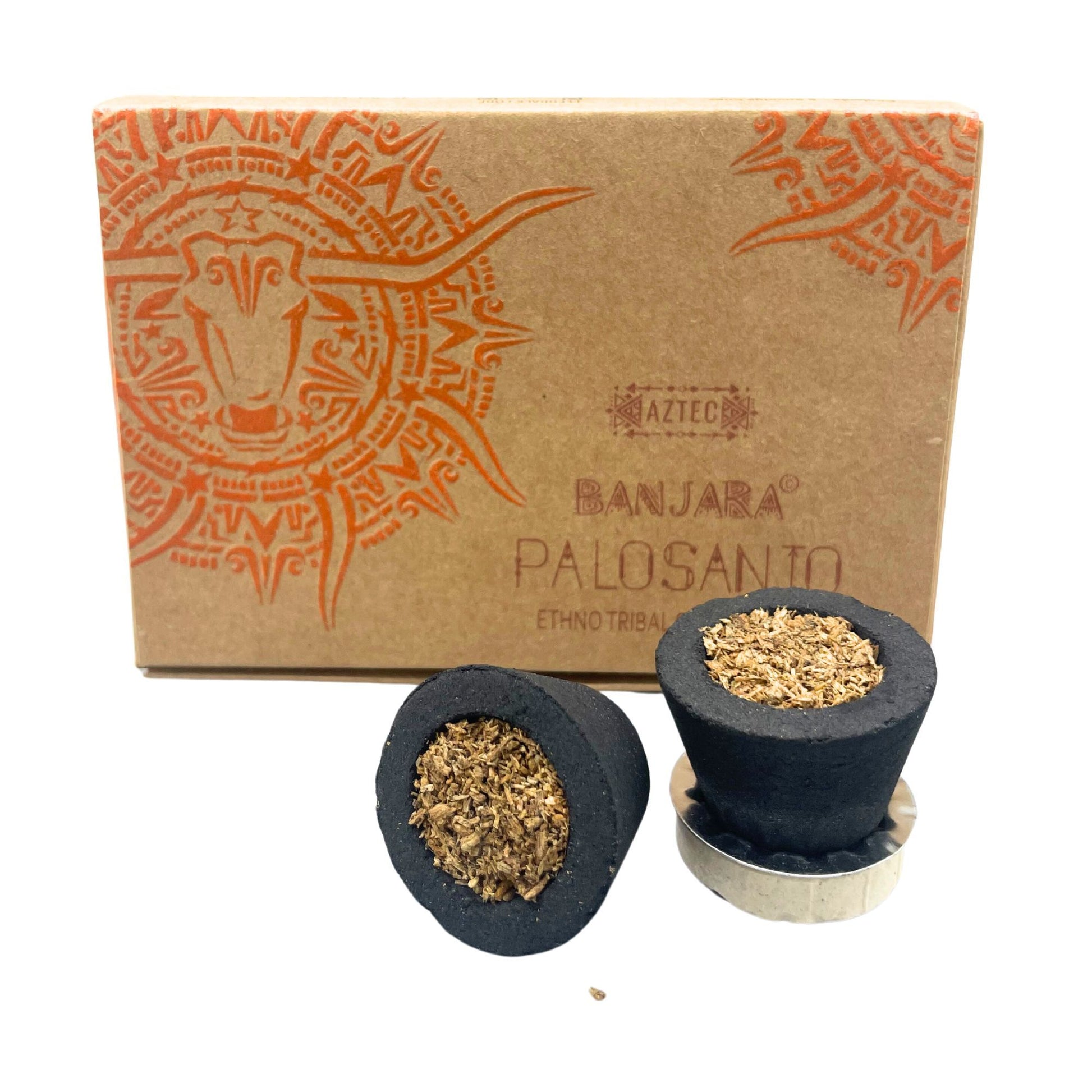 Handcrafted charcoal smudge cups filled with aromatic Palo Santo resin and wood shavings on a neutral background.