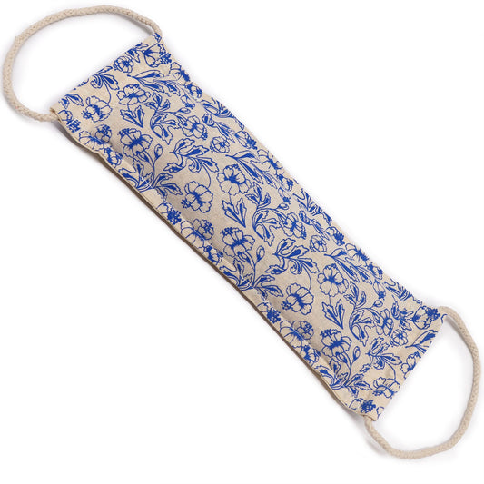 Blue natural cotton wheat bag with a rustic rope handle for targeted heat therapy and relaxation.