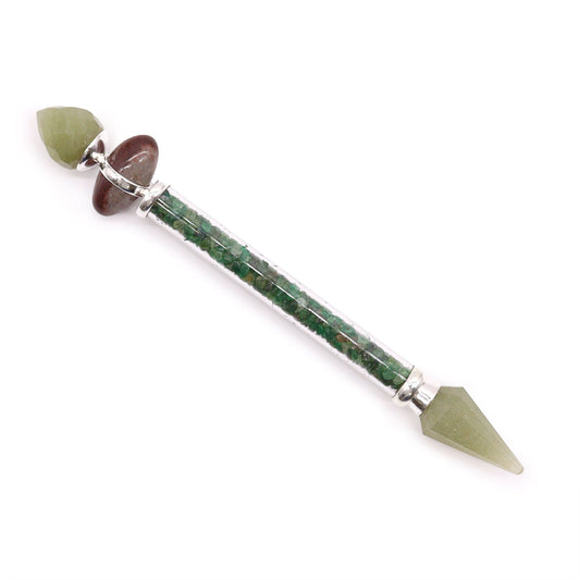 Smooth, polished green aventurine gemstone carved into a traditional Shiva Lingam shape, featuring natural pale green hues.