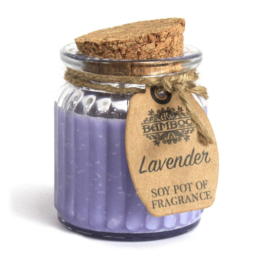 Small clay pot candle filled with purple lavender scented soy wax and a single cotton wick.