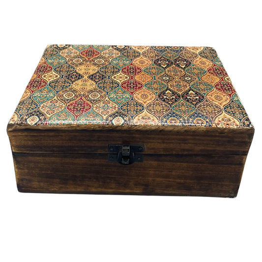Large wooden storage box with a beautiful blue and white traditional patterned ceramic glazed lid on a dark wood base.