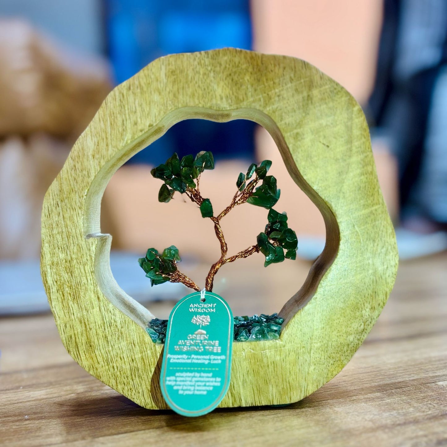 Handcrafted Green Aventurine gemstone tree with 60 chipstones on a natural mango wood ring base.