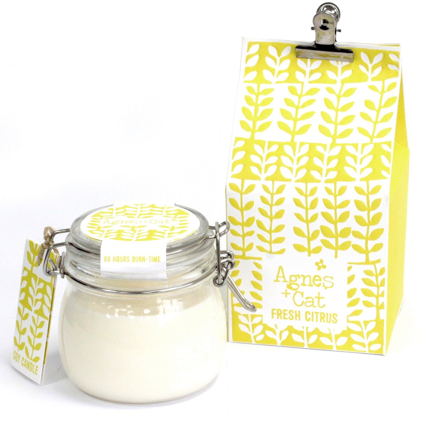 Eco-friendly soy wax candle in a classic glass Kilner jar with a zesty citrus scent and rustic clip-top lid.