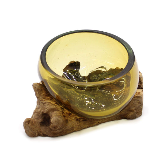 Mini amber-tinted molten glass bowl slumped over a natural gamal wood base.