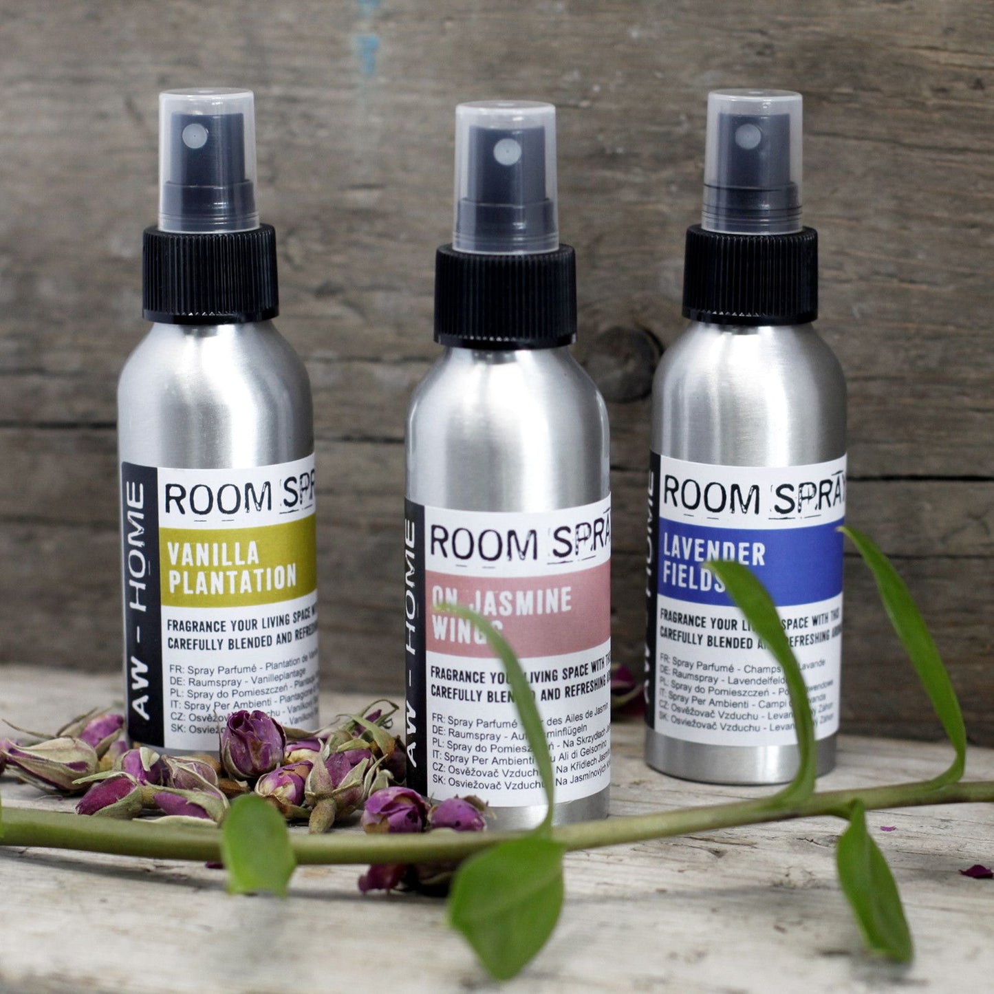 A 100ml amber glass bottle of essential oil room spray with a black mist spray pump.