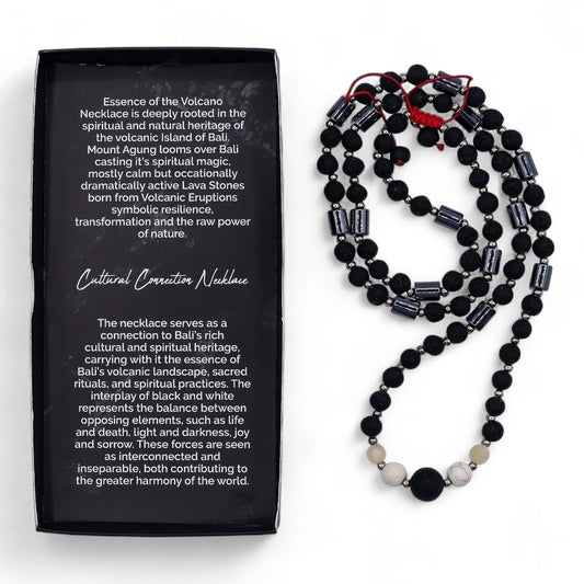 Spiritual necklace featuring a blend of textured black lava beads and smooth white howlite stones on a delicate cord.