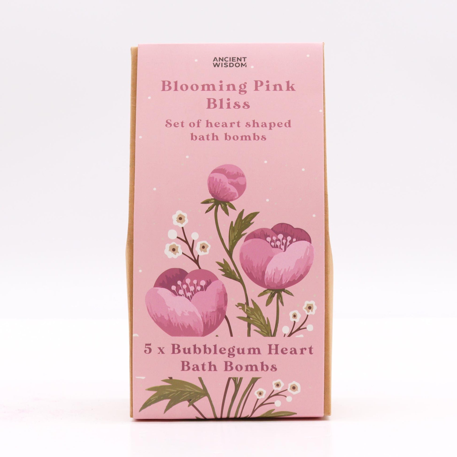 Six heart-shaped pink bath bombs arranged in a decorative gift box with floral and fruity patterns.