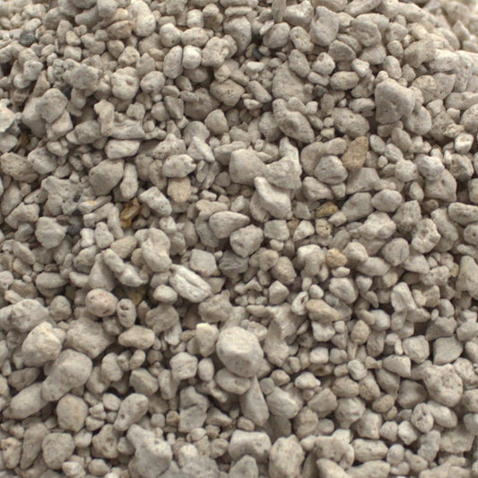 Large eco-friendly jute bag filled with small, grey-toned fine pumice stones for natural skin exfoliation.