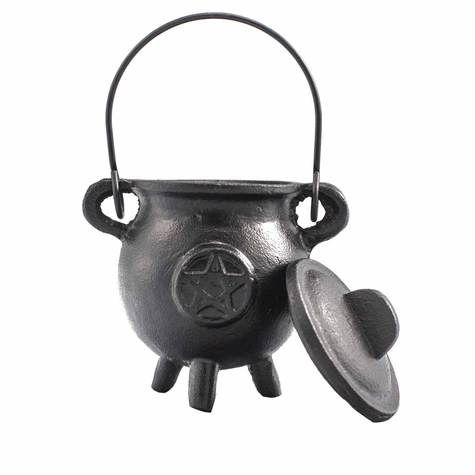 Small black cast iron ritual cauldron featuring a raised pentagon symbol on the side with three sturdy legs.