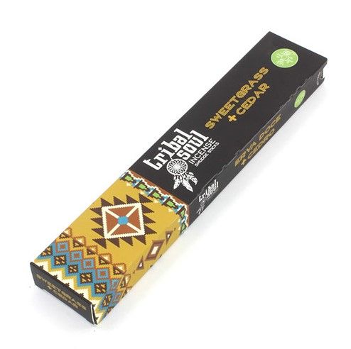 Hand-rolled incense sticks in a decorative box featuring natural sweet grass and cedar leaf illustrations.