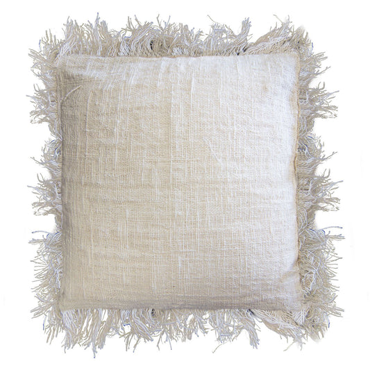 Large square linen cushion cover in a natural tone with decorative fringed edges on a neutral background.
