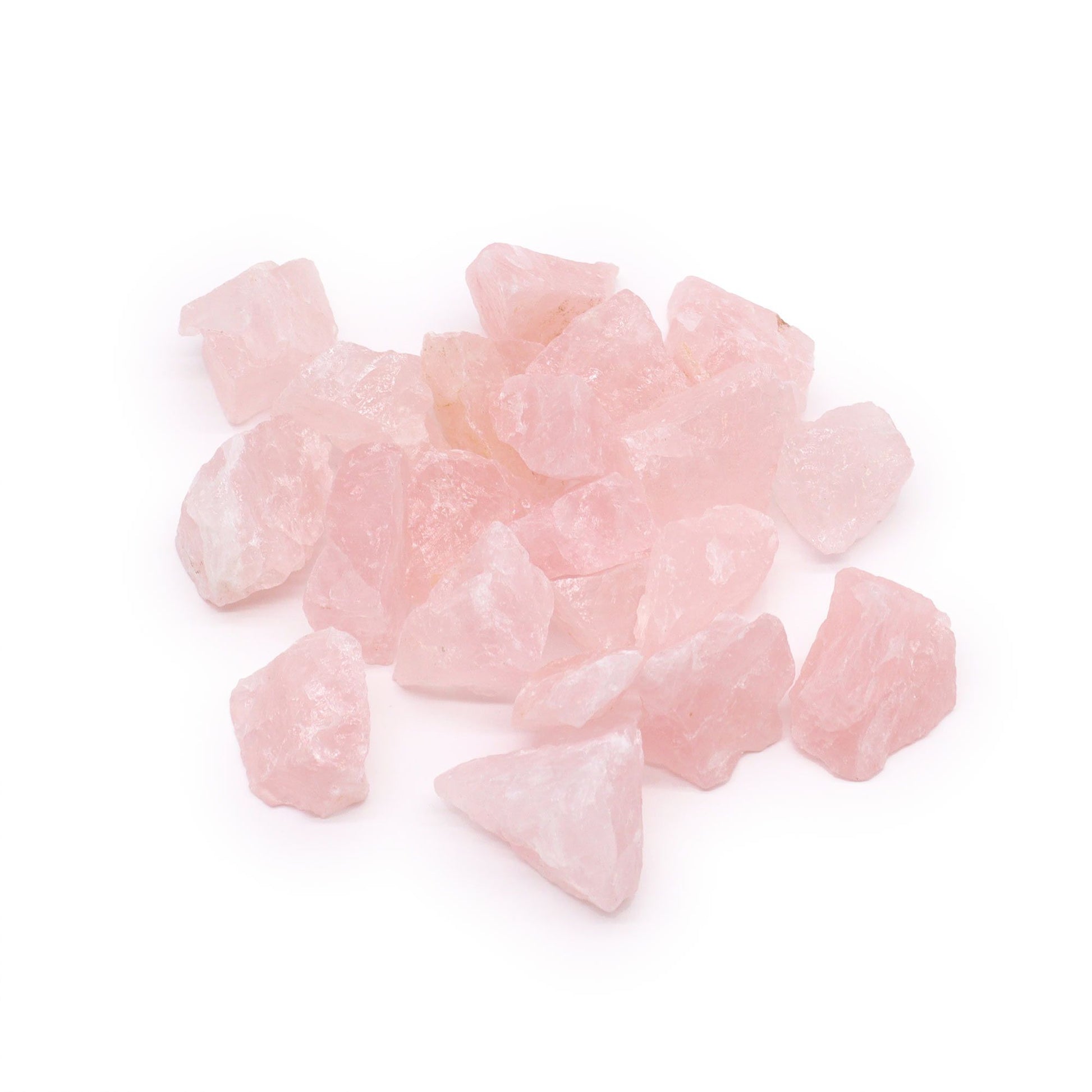 A collection of natural, rough pink rose quartz crystal stones in various sizes against a neutral background.