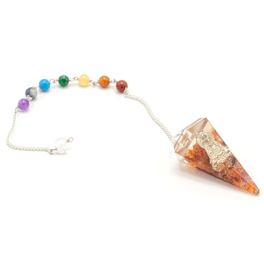 Six-faceted orgonite pendulum featuring a silver Buddha charm and seven colourful chakra gemstone chips inside resin.