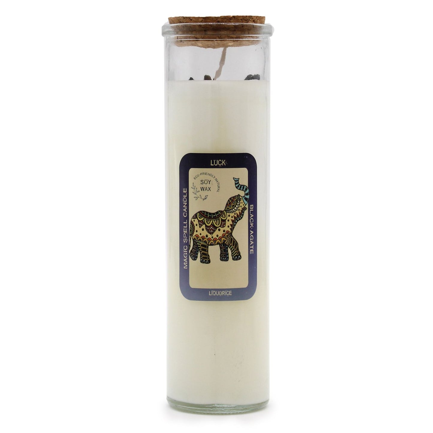 Soy wax spell candle in a glass jar topped with black agate gemstones and dried botanicals.