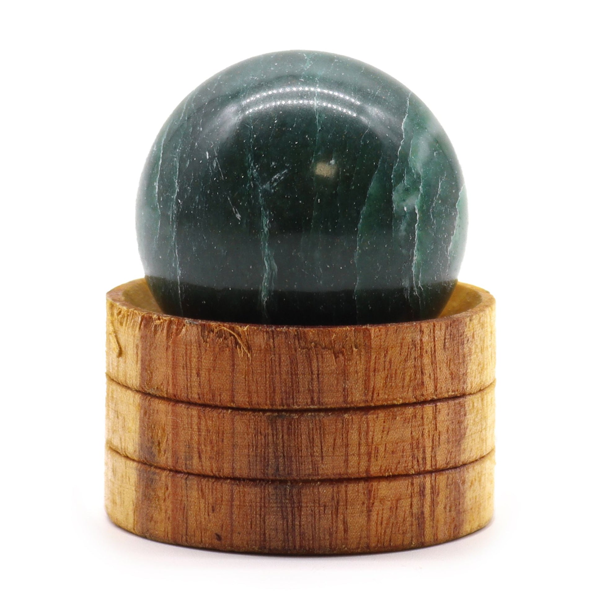 A polished 40mm green Indian Jade gemstone sphere resting on a small wooden stand.