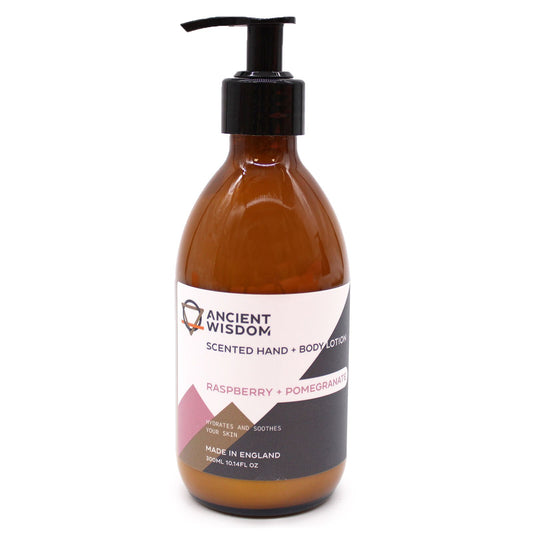Clear 300ml pump bottle filled with pink raspberry and pomegranate scented hand and body lotion.