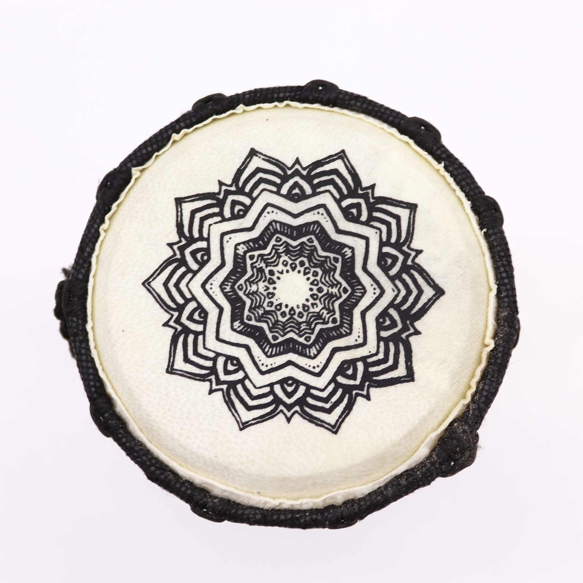 Handcrafted wooden djembe drum with a wide top and intricate hand-painted mandala design on the drum shell.