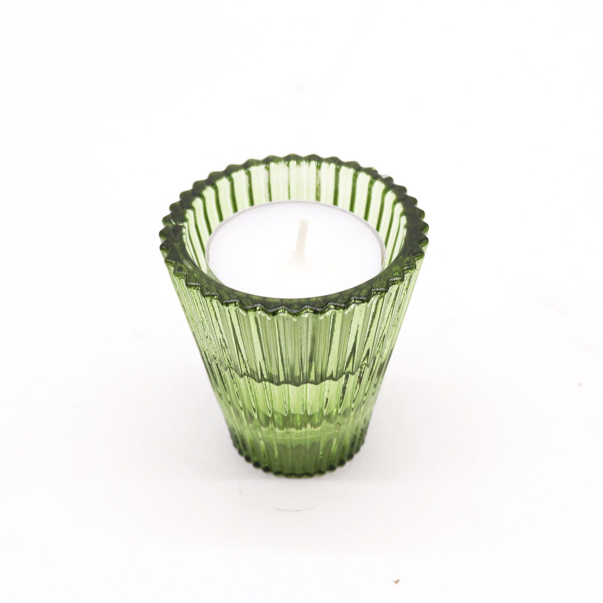 Translucent garden jade green glass candle holder with a versatile reversible design for dinner candles and tea lights.